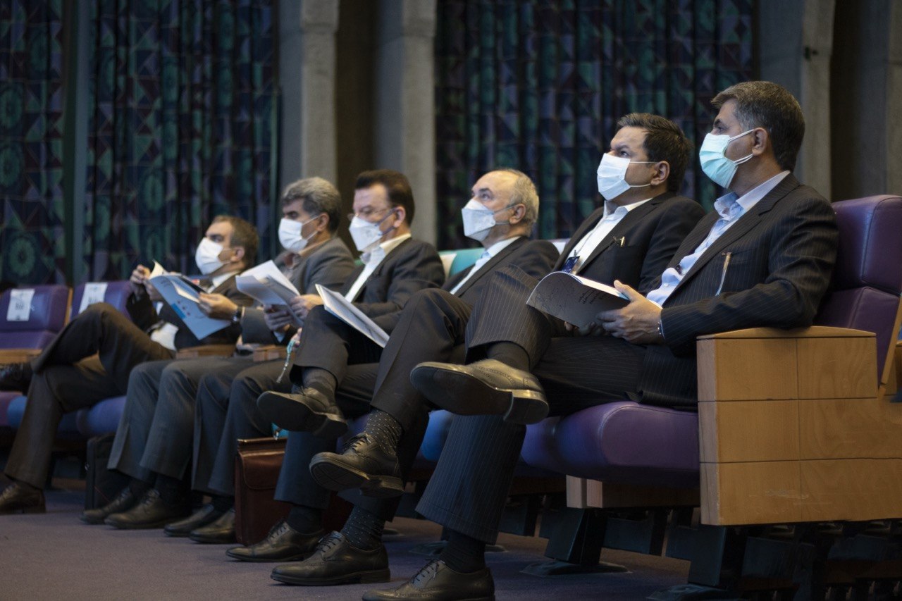 Audience following the presentation